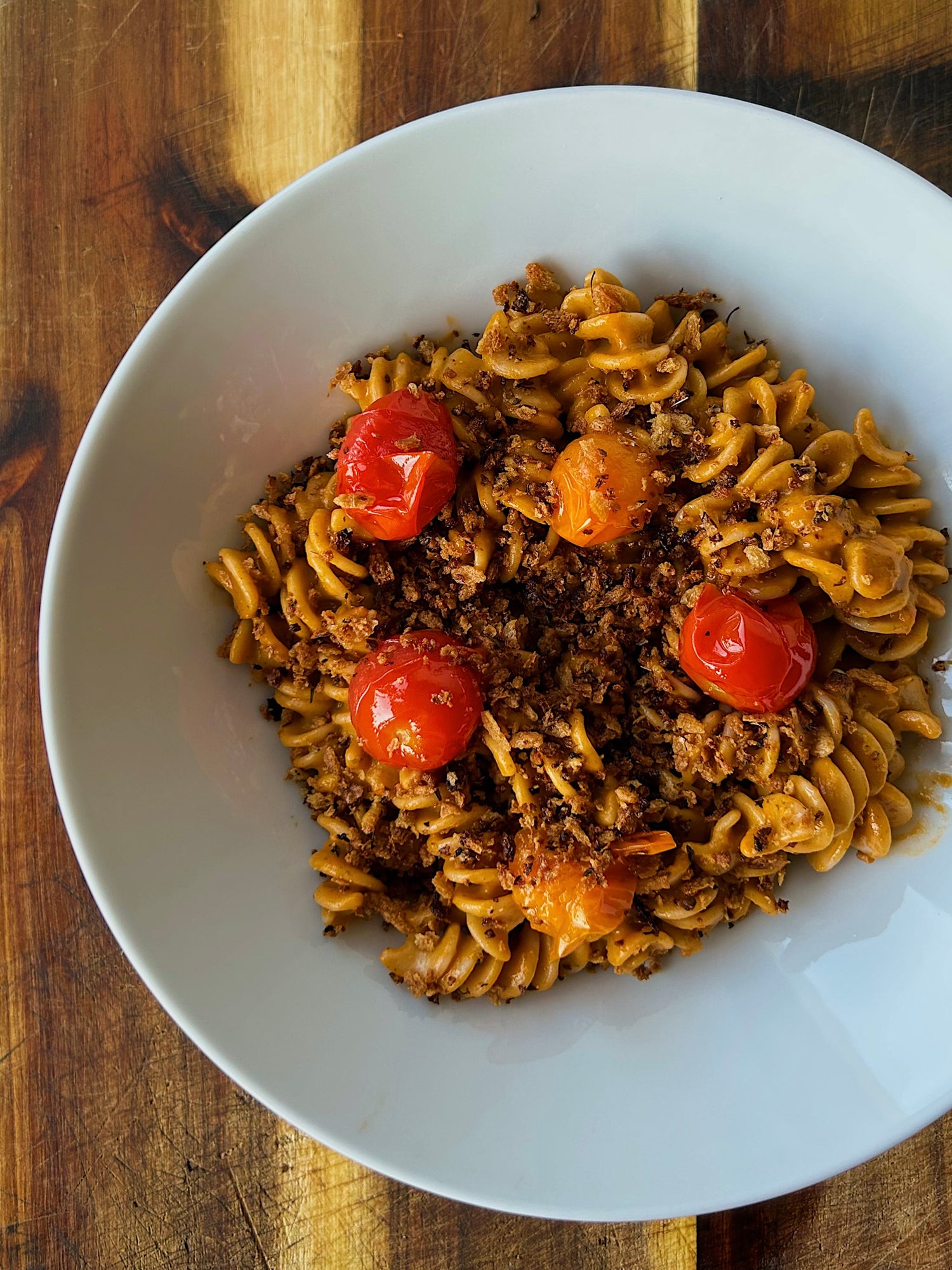 Confit tomato fusilli, with oregano pangrattato